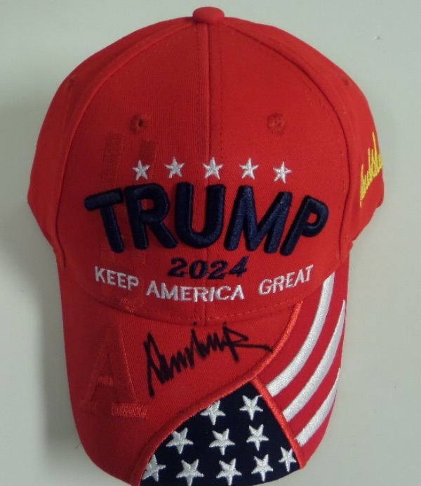 This TRUMP 2024: Keep America Great full embroidered cap is in store-bought condition, and comes hand-signed on the brim by the 47th US President himself, Donald J. Trump.  The signature grades a legible 9, and retail is high hundreds!