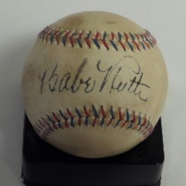 This Babe Ruth Home Run Special beautiful red and blue-laced baseball from Spalding is very old but still in VG overall condition.  It is hand-signed on the sweet spot in black fountain pen ink by The Bambino himself, his signature grading an overall 6.5-7, and with Ruth's death now more than 75 years back, retail is FIVE FIGURES on this gem!