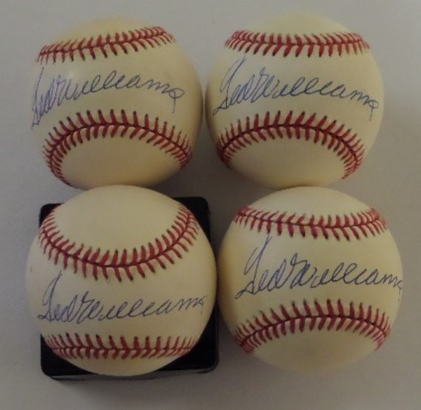 This fantastic grouping is FOUR Official Rawlings American League Bobby Brown President Baseballs, ranging from VG to EX+ condition.  Each has been penned in bold blue ink across the sweet spot by the Red Sox HOF great himself, and each has a mid hundreds book value by itself, so get in on our low, LOW minimum bid!