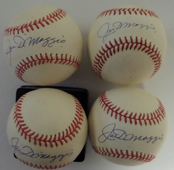 This fantastic opportunity is FOUR Official American League Baseballs from Rawlings, each in VG+ through EX/EX+ condition.  Each ball is blue ink-signed across the sweet spot by long-deceased Yankees HOF centerfielder, Joe DiMaggio.  A great lot of 4 baseballs, with a book value at ONE THOUSAND TIMES our paltry minimum bid!