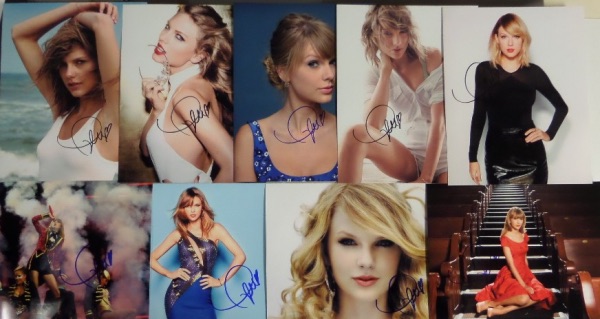 This ideal group lot is TWENTY-ONE different full color 8x10 photos, including concert shots, poses, and all kinds of colorful images, each hand-signed by the superstar pop/country singer.  Each photo can retail into the hundreds with the huge popularity of Swift, so you do the math with twenty-one!!!