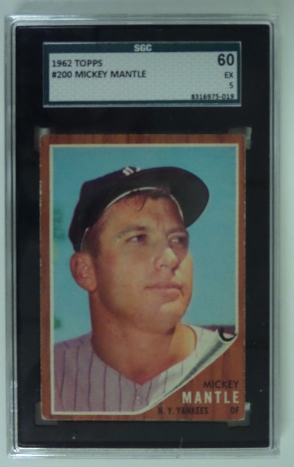 This 1962 Topps #200 Mickey Mantle baseball card is slabbed and graded EX 5 by SGC! Everything has been done for you here, and there is literally nothing to do with this gem but bid, win, display, and enjoy!  With the added authenticity and grade from the highly-reputable SGC company, a fair retail here is mid/high hundreds!