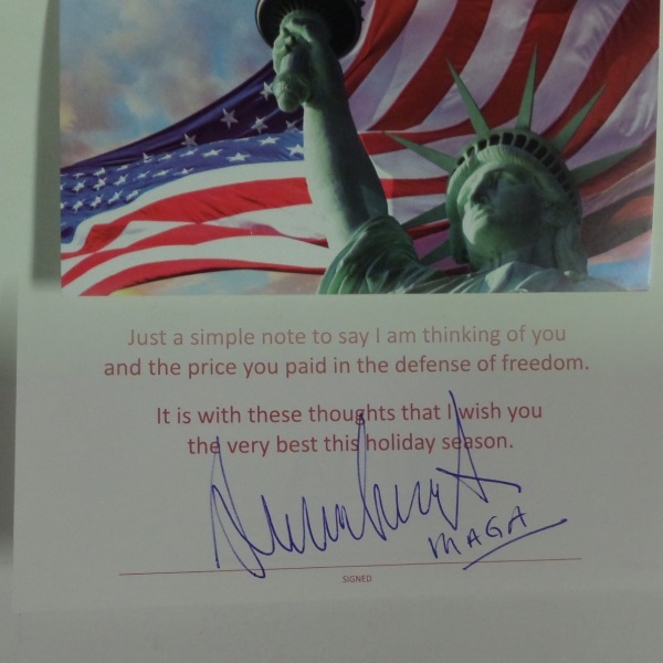 This greeting card from The Paralyzed Veterans of America organization has a patriotic Flag/Statue of Liberty front, and opens to reveal that it has been blue ink-signed by 45/47 himself.  The signature grades a big, bold 9 overall, and this card will make for a wonderful addition to any Presidential/Americana collection.  Valued into the low thousands!