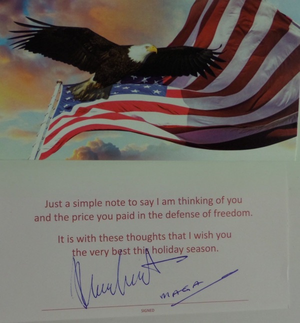 This greeting card from The Paralyzed Veterans of America organization has a patriotic Flag/Statue of Liberty front, and opens to reveal that it has been blue ink-signed by 45/47 himself.  The signature grades a big, bold 9 overall, with MAGA included, and this card will make for a wonderful addition to any Presidential/Americana collection.  Valued into the low thousands!