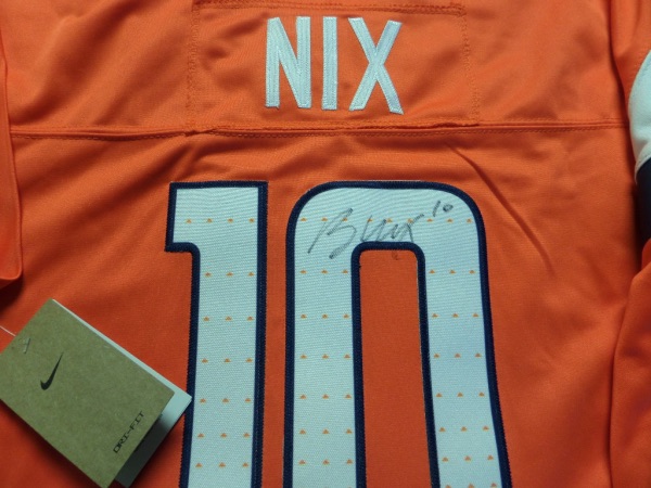 This mint authentic orange beauty comes signed by this Rookie QB who led them to the playoffs this year! Great black sharpie autograph with his #10 included and guaranteed authentic. Value will only rise as he is the real deal! 
