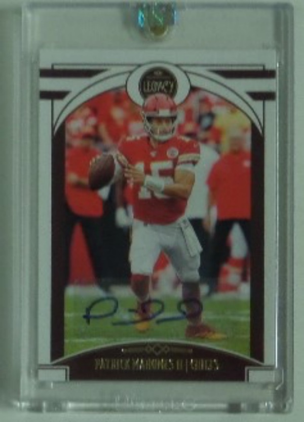 This mint gem shows this future HOFer in action and comes signed in blue with the Panini Seal on it!  Slabbed in lucite screwdown and sealed at the top also by Panini. Retails into the thousands and RARE!  A real beauty as he might go down as the all time best