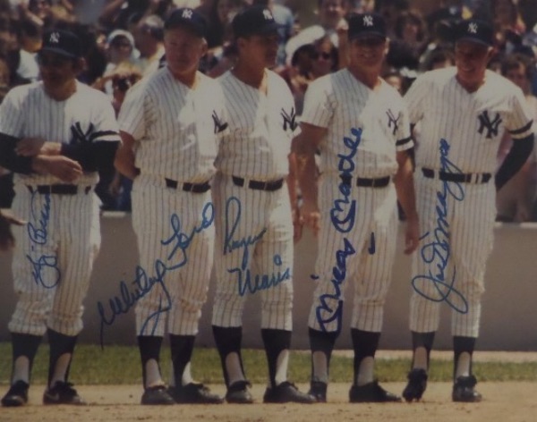 This full color 8x10 photo is an image from a 1980's New York Yankees Old Timers Game, and five of the greatest to ever don the pinstripes standing on a baseline.  It is hand-signed in blue by all five, including Mantle, Maris, Berra, Ford and DiMaggio, and, with all five long gone, retail on this gem of a photo is high hundreds!