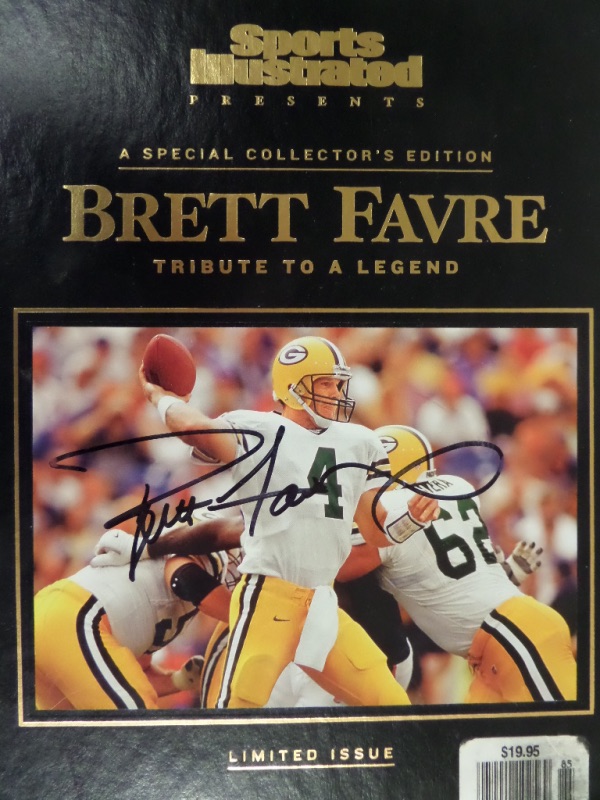 This Sports Illustrated Presents A Special Collector's Edition Brett Favre Tribute to a Legend hardbound book is a limited edition with the MINT magazine on the inside.  It is EX/MT on the outside, and comes hand-signed in black sharpie by the HOF passer himself.  Signature is a legible 8, and the book is valued into the mid hundreds, but the value of this piece, when displayed, is immeasurable!