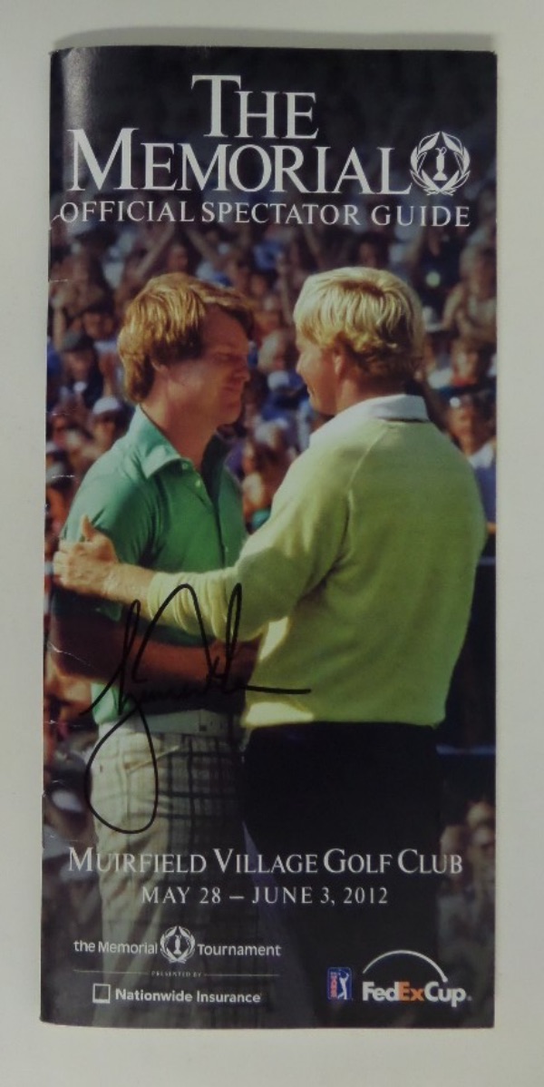 This 2012 Official Spectator Guide for The Fed Ex Cup Memorial Tournament is in EX/MT condition, with a color image of all time greats Tom Watson and Jack Nicklaus.  It is hand-signed over the image in black sharpie by 14 time Major winner Tiger Woods, and is honestly one of the better Tiger autographs that I've ever seen, grading a legible 9.  Small in stature, but BIG on value, this piece can retail into the mid/high hundreds!