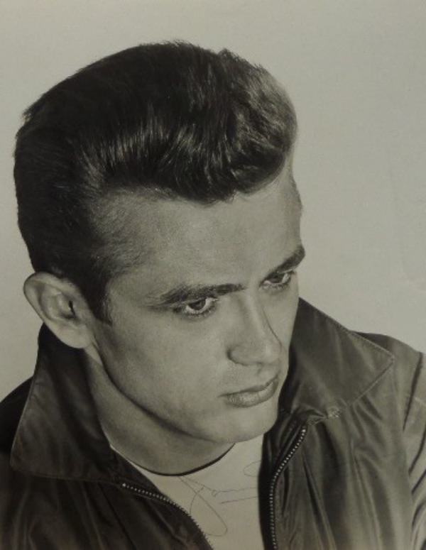 This very old black and white 8x10 photo is a "Rebel Without a Cause" image of the late, great James Dean.  It is hand-signed in black ink by the screen idol himself, and grades a light 4 overall.  With his untimely death now SEVENTY years ago, retail on this collector's item is easily low thousands!