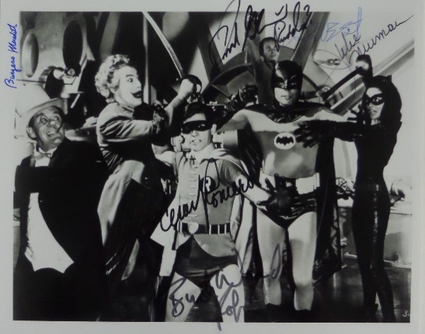 This amazing TV collector's fantasy is a black and white 8x10 depicting a scene from the hit 1960's "Batman" television show.  It comes hand-signed by all six actors shown!  Included are Adam West, Burt Ward, Julie Newmar, Frank Gorshin, Cesar Romero and Frank Gorshin, and with 4 of the 6 no longer with us, retail is VERY high hundreds on this TV gem!!!
