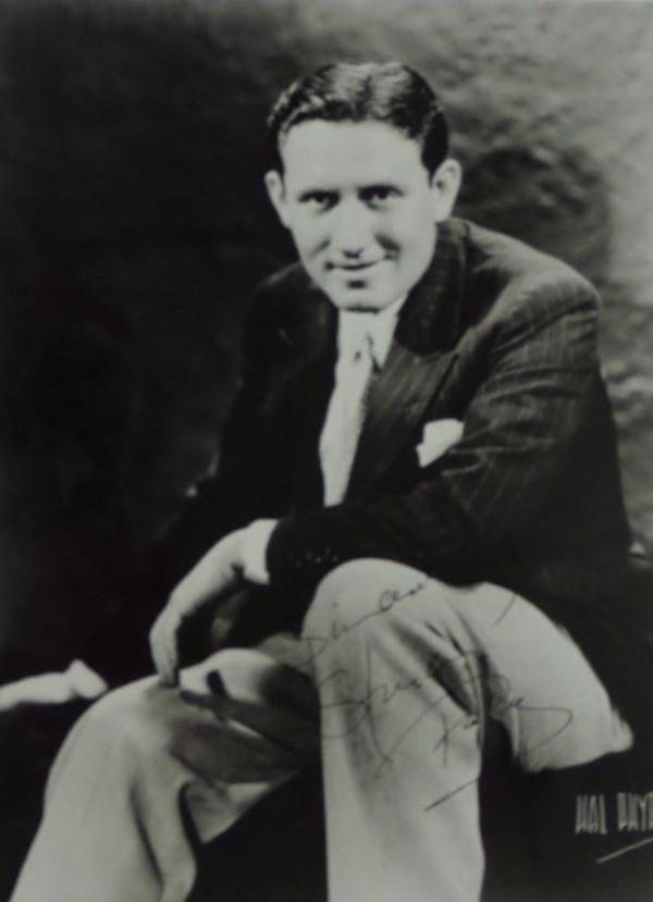 This amazing Hollywood collector's item is a black and white glossy 8x10 of a very young, circa 1930's Spencer Tracy.  It comes hand-signed in black by the 2 time Academy Award winner himself, grading a legible 8-8.5, with Sincerely added in his hand.  With his death now approaching 60 years ago, retail on this beautiful photo is low thousands!