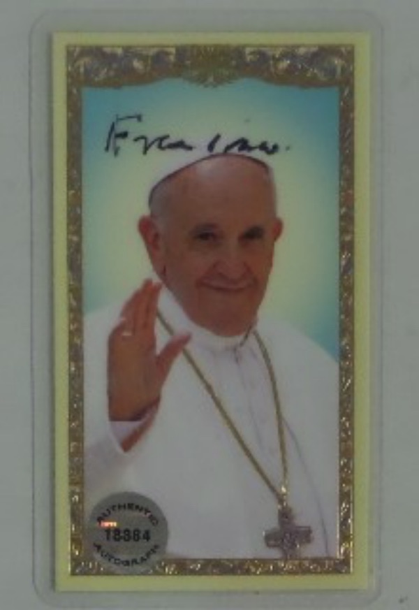 This 2014 Ambrosiana "Prayer For the Pope" Pope Francis prayer card is a bit bigger/longer than a regular trading card, and comes to us in NM/MT condition!  It is hand-signed in black sharpie or flair pen by the Pontif himself, is 100% authentic, and retail is high hundreds
