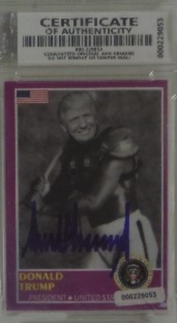 This super cool, high value card is slabbed and guaranteed authentic, shows our leader with bat in hands and shoulder pads, ala Bo Jackson, and comes hand signed in bold, perfect blue sharpie. This thing is a gem, a probable one of a kind, and sells here at the "Corner" with NO reserve! 