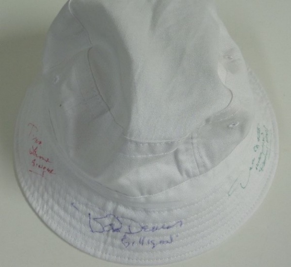 This white bucket hat is still in EX/MT shape, and resembles the one that Bob Denver wore as the titular character in the hit 1960's comedy, "Gilligan's Island."  It is hand-signed in blue ink by Denver, in green by Dawn Wells, and in red by Tina Louise, with each person adding their character's name as an inscription.  A MUST HAVE television item, valued into the high hundreds!