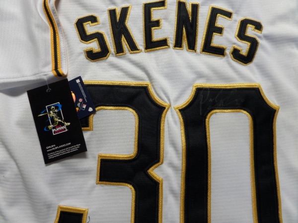 This mint white authentic Pirates jersey has sewn on EVERYTHING and is trimmed in black & gold. It comes signed by this top draft pick and MLB all star in his first season on his back numbers wonderfully with his #30 included! Paul will be a Cy Young winner sooner than later and the value on his autograph is skyrocketing already!  Guaranteed authentic. 