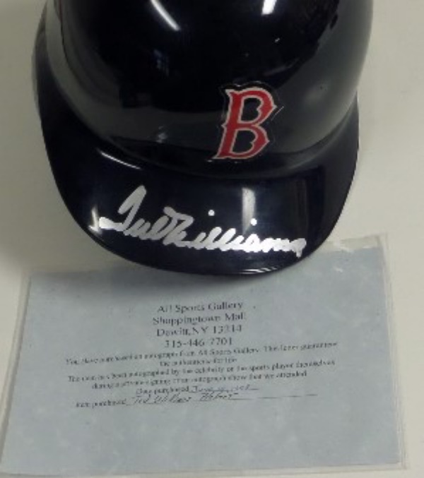 This mint, full-sized and Pro-Model helmet is a single ear flap model, a deep blue color with the "B" decal on front, and comes front brim signed by "Teddy Ballgame". It is a clear bold silver paint pen signature, ok'd by Lee for certainty, and shows off well from 30+ feet away! An All Sports Gallery lifetime LOA accompanies, and value is $695.00 or so. 