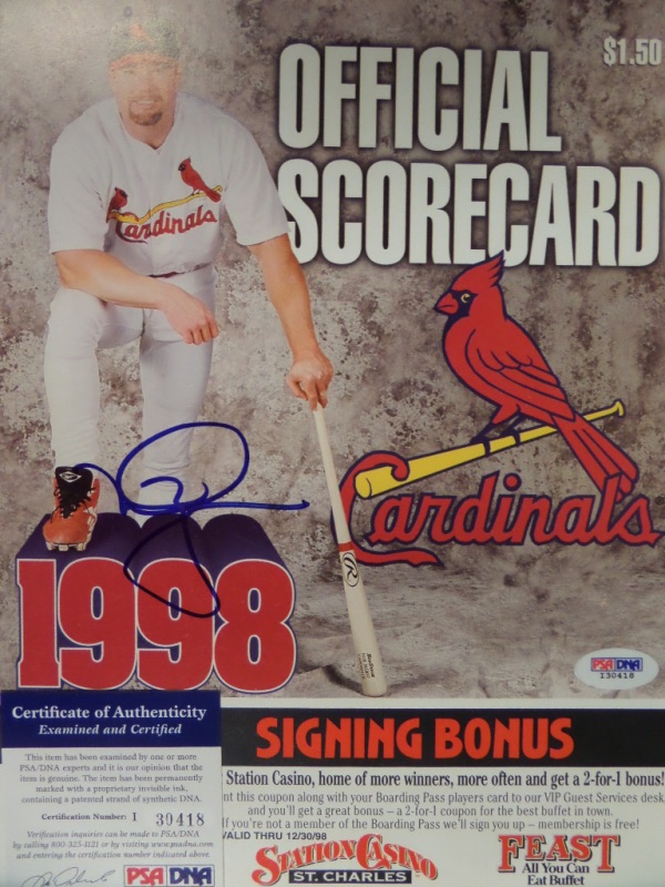 This super cool MLB collector's item is a 1998 St. Louis Cardinals Official Scorecard, with a color image of that year's HR Champion, Mark McGwire.  It is hand-signed in blue sharpie by Big Mac himself, comes fully PSA/DNA certified (I30418) for your assurance, and is a wonderful memento from a very memorable season.  Valued well into the hundreds!