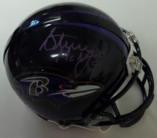 This Baltimore Ravens mini from Riddell is still in EX/MT shape, and comes hand-signed by the star QB himself.  The signature, in beautiful PURPLE paint pen, grades a legible 8.5 overall, and, with McNair's 2009 murder now 16 years in the rearview, retail is very high hundreds!