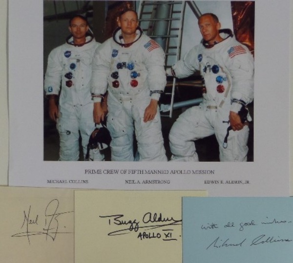 Make your own framed display with this lot of three cuts of paper, each measuring about 3x5, and each hand-signed by a different Apollo 11 moon landing crew member.  Included are Neil Armstrong, Michael Collins, and Buzz Aldrin, and a color photo of the crew is included for display!