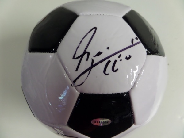 This mint Champion soccer ball is white with black trim and comes signed by the best ever in black with his #10 and "LEO" included!! Guaranteed authentic and comes hologrammed and ready for display for the soccer collector. Retails in the mid-high hundreds and now he's playing and winning it all in Miami! He has done it all and still going!