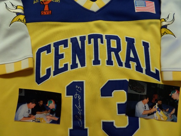 This yellow, blue and white XL Marino #13 CENTRAL high school throwback football jersey is from School Yard Legends, and is in NM condition, with everything beautifully-sewn.  It is front number-signed in bright silver by the all time NFL great and Miami Dolphins HOF quarterback himself, and will frame and display proudly in any football collection.  Super unique collector's item, and with the two signing photos that accompany for provenance, valued into the high hundreds!