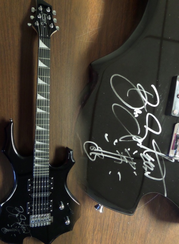 This mint black electric beauty comes in the original box with accessories/carry bag included. It comes signed PERFECTLY by this legend in silver sharpie with a hand drawn picture of a guitar added by the Boss!!!  Guaranteed authentic and as nice as you will ever see from Bruce! Retails into the thousands.
