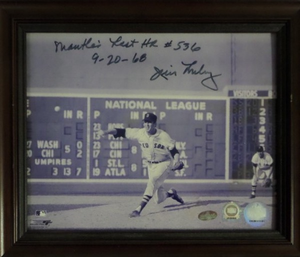 This black and white 8x10 is nicely framed, and is an image of '67 Cy winner Jim Lonborg, in the process of serving up Mickey Mantle's final home run!  It is hand-signed by Lonborg in black felt tip marker, with Mantle's Last HR #536 and 9-20-68 inscriptions, and comes affixed with holograms from both MLB (MT00636848) and Ironclad Authentics for absolute authenticity!  