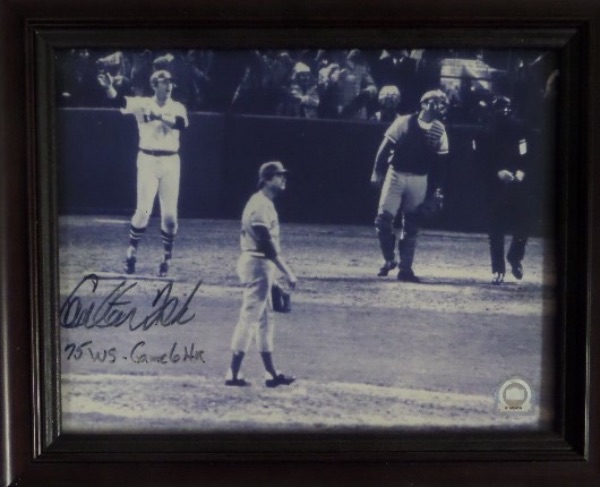 This framed black and white 8x10 photo is an image of one of baseball's most enduring moments; the dramatic 11th Inning Game 6 home run by Carlton Fisk in the '75 Series!  It is hand-signed in black felt tip marker by the HOF receiver himself, complete with a 75 WS Game 6 HR inscription, and the photo is affixed with a hologram from MLB (MT00294304) for rock solid authenticity.  Ready for your Red Sox collection, and valued well into the hundreds!