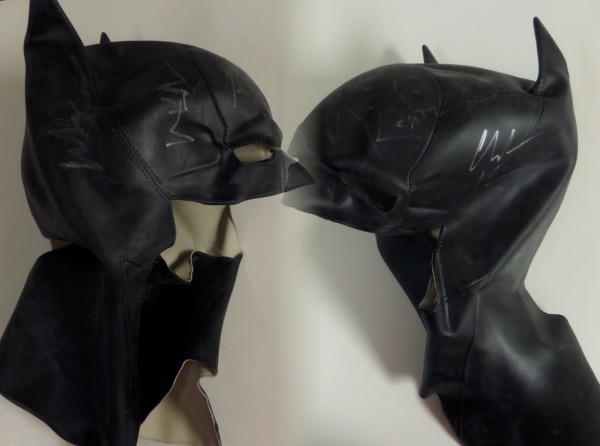 This high quality black latex mask is in great shape and unworn and comes signed in silver by 6 stars that played the caped crusader on the big screen!  Included are CLOONEY, KEATON, BALE, KILMER, AFFLECK, & PATTINSON!  Sig's are in EX shape overall as the mask must have been very hard to autograph.  Guaranteed authentic and i have not seen another around! High retail. 