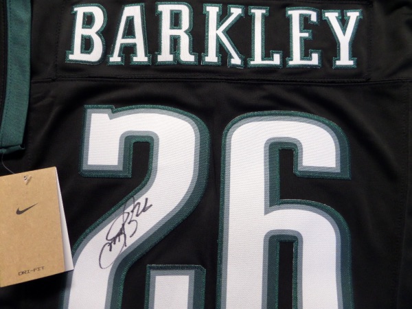 This mint authentic black Eagles jersey comes signed by the newest Eagles RB superbly on his back numbers with #26 included!  Great jersey from this All-Pro and retail is shooting up fast as Philly just won the Super Bowl as I am typing this in!  Guaranteed authentic and Saquon had monster year and broke 2k rushing yards!