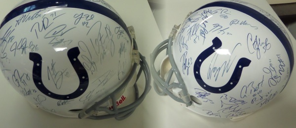 This full size, replica style Indianapolis Colts helmet from Riddell is in store bought condition, and comes blue sharpie signed by more than 40 members of the 2009 Colts roster!  Included are Vinatieri, Clark, Wayne, Manning, Freeney, and all the rest of the team's big names, and this helmet easily books in the very high hundreds!