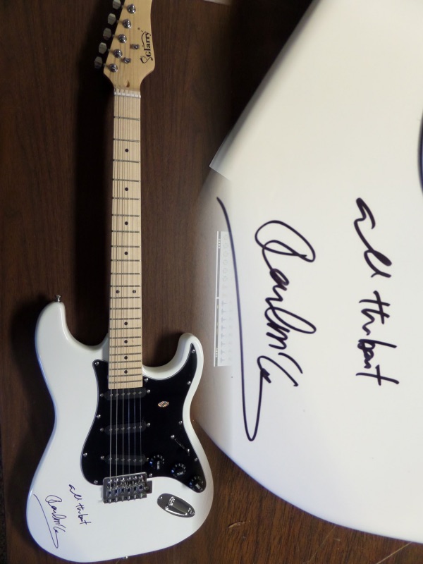 This gorgeous mint electric white strat style guitar comes with the original box, pick ups, bag, straps,etc. and comes signed by the best singer/songwriter of all time in black. SUPERB autograph and shows off wonderfully. Guaranteed authentic and get it now because Paul is a tough autograph and not getting any younger! He even included "ALL THE BESTt" above his tough-to-get signature!